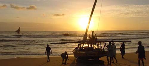 Local Fisherman arrive at sunset.Iguape Aquiraz Fortaleza